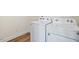 Laundry room featuring a white washer and dryer set at 65 Hickory Run Ln, Franklinton, NC 27525