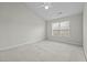 Bright bedroom with vaulted ceilings and natural light at 653 Huntingdon St, Elon, NC 27244