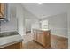 Bright kitchen featuring a functional island and eat-in dining area at 653 Huntingdon St, Elon, NC 27244