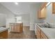 Well-lit kitchen with island and double sink at 653 Huntingdon St, Elon, NC 27244
