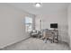 Bedroom has a window and desk set up, creating an ideal space for work or study at 656 Dallas Rose Dr, Wendell, NC 27591