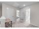 Upstairs hallway features neutral walls, carpet, and white doors to bedrooms and other rooms at 656 Dallas Rose Dr, Wendell, NC 27591