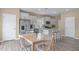 Bright kitchen and dining area featuring modern appliances and stylish decor at 656 Dallas Rose Dr, Wendell, NC 27591