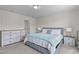 Serene main bedroom showcasing stylish furnishings, soft carpet, and an ensuite bathroom, creating a comfortable and private space at 656 Dallas Rose Dr, Wendell, NC 27591