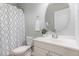 Full bath with white vanity, neutral walls and a shower and tub combination at 7533 Silver View Ln, Raleigh, NC 27613