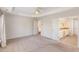 Large primary bedroom boasting neutral carpet, and easy access to a primary bathroom at 7533 Silver View Ln, Raleigh, NC 27613