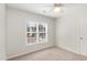 An additional bedroom featuring neutral walls and carpet, and a window for natural light at 7533 Silver View Ln, Raleigh, NC 27613