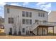 Exterior of home showcasing deck, backyard and multi-pane windows at 7533 Silver View Ln, Raleigh, NC 27613