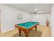 Finished basement with a pool table, perfect for entertaining at 7533 Silver View Ln, Raleigh, NC 27613