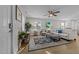 Bright living room featuring a ceiling fan, neutral paint, hardwood floors, and lots of natural light at 805 N Elizabeth St St, Durham, NC 27701