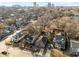 Aerial view showcases this home's location in a neighborhood with mature trees, close to the city at 805 N Elizabeth St St, Durham, NC 27701