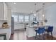 Modern kitchen with white cabinets, granite counters, and stainless steel appliances at 829 Winter Meadow Dr, Wake Forest, NC 27587