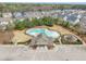 Community clubhouse and pool, near well-manicured lawns in a residential neighborhood at 8304 Rosiere Dr, Cary, NC 27518