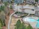 Community amenities include playground, sidewalks, and a pool, near well-manicured homes at 8304 Rosiere Dr, Cary, NC 27518