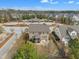 Aerial view of a two-story home in a neighborhood near community pool and amenities at 8304 Rosiere Dr, Cary, NC 27518