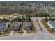 Aerial view of a neighborhood featuring two-story homes with well-maintained landscaping at 8304 Rosiere Dr, Cary, NC 27518