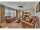 Cozy living room features hardwood floors, comfortable seating, and an open concept design at 8304 Rosiere Dr, Cary, NC 27518