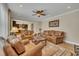 Comfortable living room offers hardwood floors, fireplace, plush seating, and an open floor plan at 8304 Rosiere Dr, Cary, NC 27518