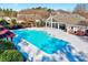 Large community pool surrounded by mature landscaping and comfortable lounge areas at 833 Providence Glen Dr, Chapel Hill, NC 27514