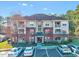 Charming condominium with well-maintained landscaping, reserved parking, and traditional brick and siding exterior at 833 Providence Glen Dr, Chapel Hill, NC 27514