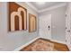 Inviting entryway featuring hardwood floors, stylish decor and white trim at 833 Providence Glen Dr, Chapel Hill, NC 27514