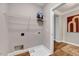 Laundry room featuring wire rack shelving and tile floor at 833 Providence Glen Dr, Chapel Hill, NC 27514