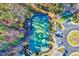 Aerial view of a well-maintained tennis court and parking near a residential community at 833 Providence Glen Dr, Chapel Hill, NC 27514