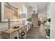 Inviting entryway with hardwood floors, staircase, console table, and decorative accents at 938 Haybeck Ln, Apex, NC 27523
