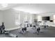 Bright fitness center featuring stationary bikes and a rowing machine for a complete workout experience at 938 Haybeck Ln, Apex, NC 27523