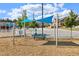 Community playground with shade and seating for outdoor enjoyment at 938 Haybeck Ln, Apex, NC 27523