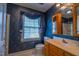 Bathroom with floral wallpaper and vanity at 94 Cedar Hills Cir, Chapel Hill, NC 27514