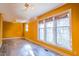 Bedroom with hardwood floors and large windows offers a bright space at 94 Cedar Hills Cir, Chapel Hill, NC 27514