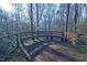 Wooden bench in a wooded area at 94 Cedar Hills Cir, Chapel Hill, NC 27514