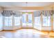 A light-filled breakfast nook features an ornate light fixture and bright natural light at 94 Cedar Hills Cir, Chapel Hill, NC 27514