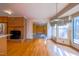 Brick fireplace accents breakfast nook with bright natural light at 94 Cedar Hills Cir, Chapel Hill, NC 27514