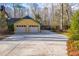 Two car garage and spacious concrete driveway at 94 Cedar Hills Cir, Chapel Hill, NC 27514