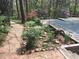 Beautiful garden and brick pathway lead to the pool area at 94 Cedar Hills Cir, Chapel Hill, NC 27514