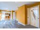 Living room with hardwood floors shows staircase and access to kitchen at 94 Cedar Hills Cir, Chapel Hill, NC 27514