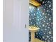Powder room featuring floral wallpaper and a pedestal sink at 94 Cedar Hills Cir, Chapel Hill, NC 27514