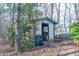 Outdoor shed for backyard tools and storage at 94 Cedar Hills Cir, Chapel Hill, NC 27514