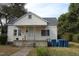 Quaint one-story home with a covered front porch and classic charm at 1005 N Wilson Ave, Dunn, NC 28334