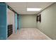 Finished room in the basement with carpet, window and storage closet at 1021 Whetstone Ct, Raleigh, NC 27615