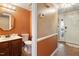 Cozy bathroom features vanity with sink, toilet, and neutral paint color at 1021 Whetstone Ct, Raleigh, NC 27615
