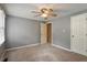 Bedroom featuring carpet flooring, one window for natural light and grey walls at 1021 Whetstone Ct, Raleigh, NC 27615