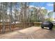 Spacious wooden deck with grill, ideal for outdoor cooking and entertaining at 1021 Whetstone Ct, Raleigh, NC 27615