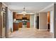Eat-in kitchen boasts tile floors, stainless steel appliances, and stylish light fixture at 1021 Whetstone Ct, Raleigh, NC 27615