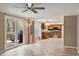 Open floorplan kitchen and living area with tile floors and lots of natural light at 1021 Whetstone Ct, Raleigh, NC 27615