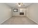 Spacious main bedroom featuring neutral carpet, ceiling fan, and ensuite bathroom access at 1021 Whetstone Ct, Raleigh, NC 27615