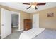 This bedroom offers a ceiling fan and a chest of drawers at 1024 Jensen Grove Ct, Fuquay Varina, NC 27526