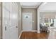 Welcoming entryway with hardwood floors, leading to a cozy living area and featuring a closet at 1024 Jensen Grove Ct, Fuquay Varina, NC 27526